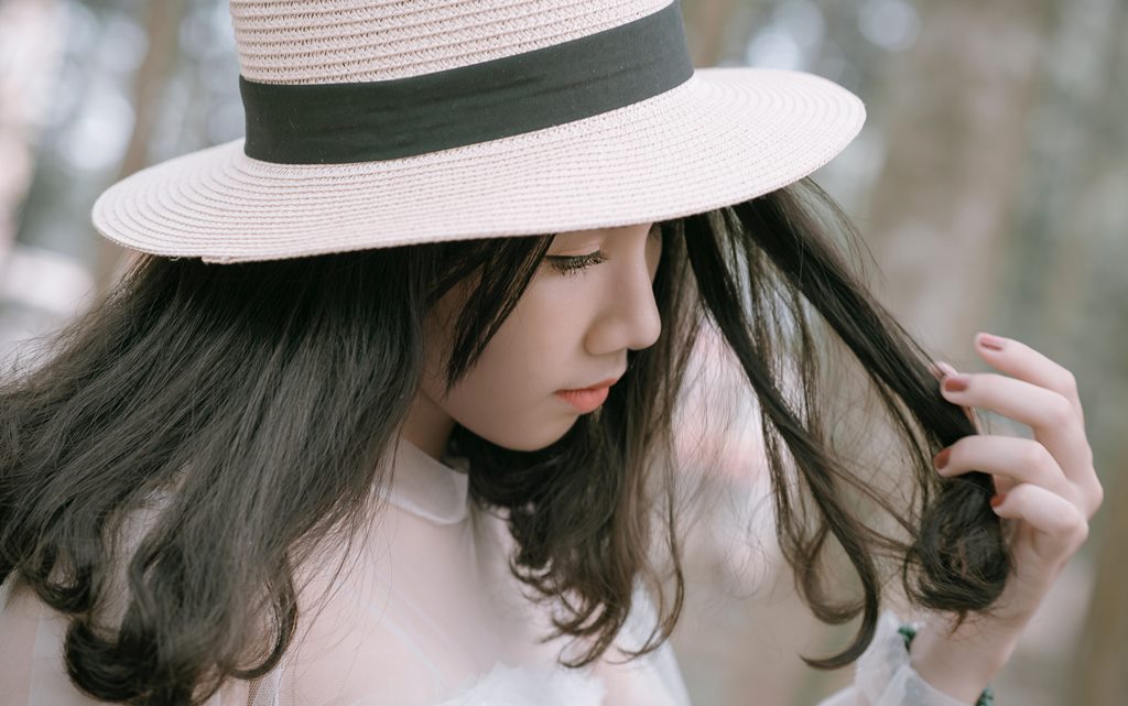 girl with a hat on