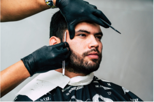a man getting a hir cut